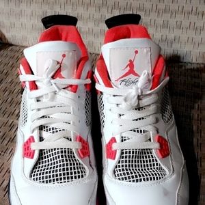 White black and red size 12 air Jordan 4's